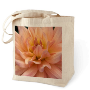 Canvas bag with a up close picture of a dahlia bloom.